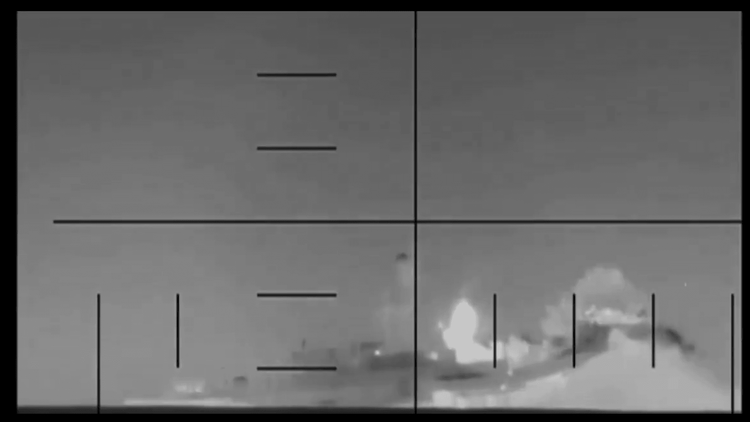 Image of IRIS Dena as the Mark 48 torpedo impacts the vessel. Image released by U.S. Department of War (footage of the attack)